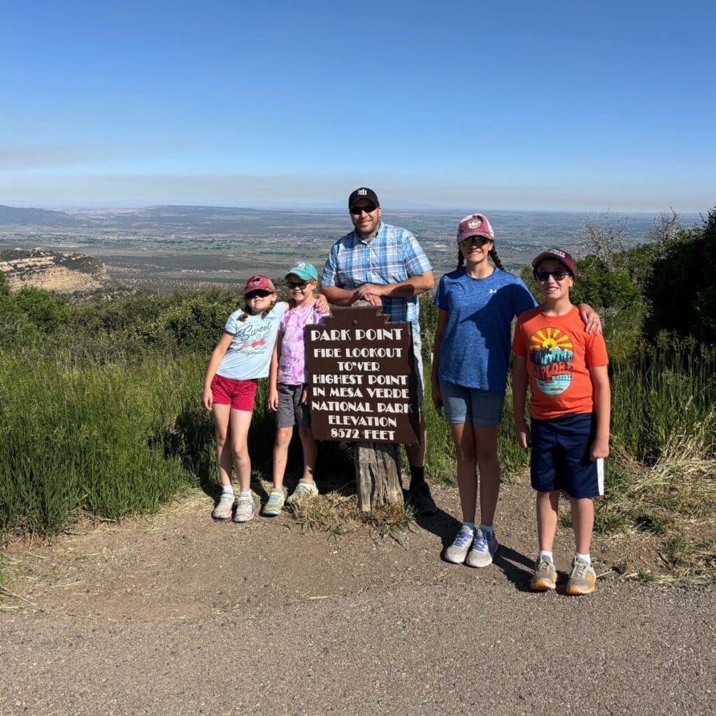 people posing at park point overlook