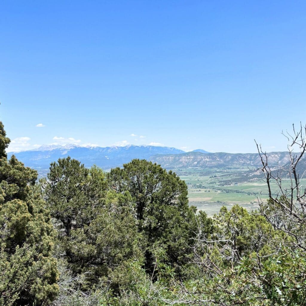 Rocky Mountains in a distance as seen from Mesa Verde