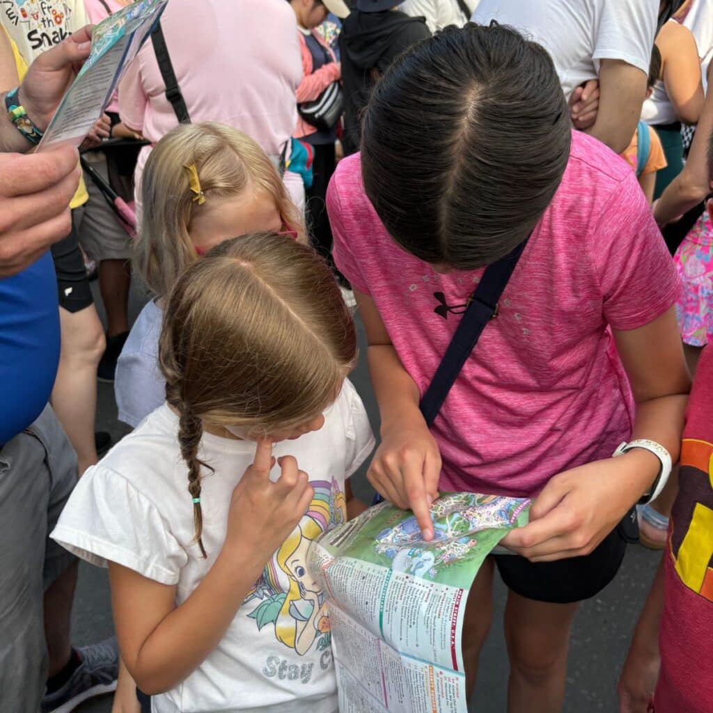 kids reading map at Disney World