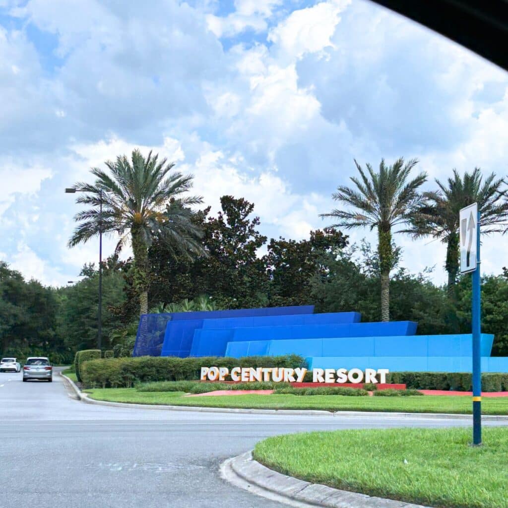 entrance to pop century blue sign