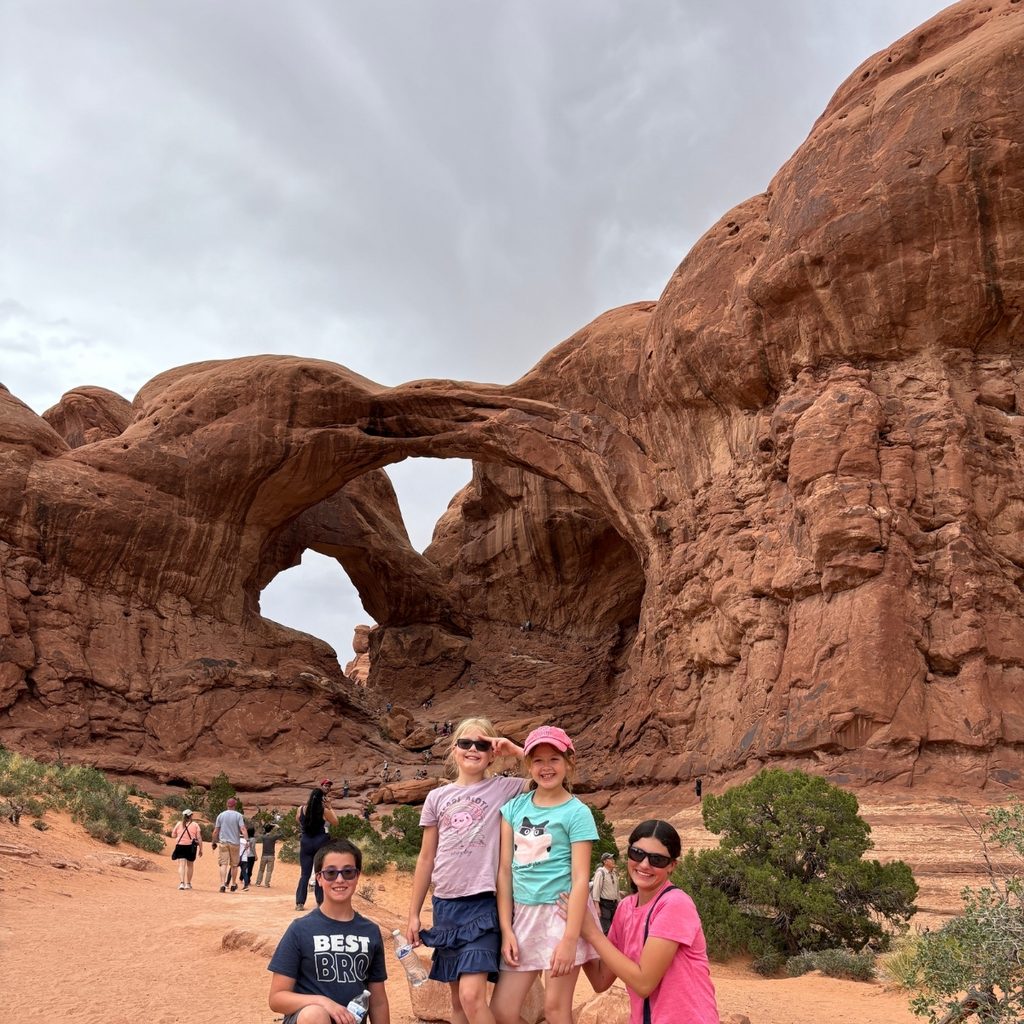 kids at Double Arch at Arches National Park